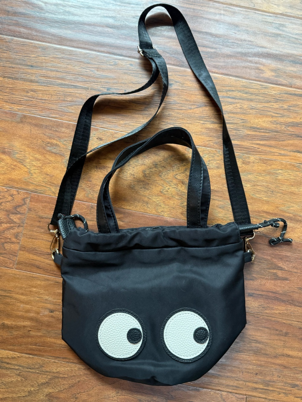Black Shoulder Bag with Playful Eye Appliqués